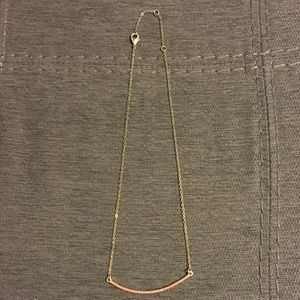Coral and gold curved bar necklace